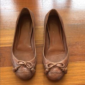 Brown leather flats